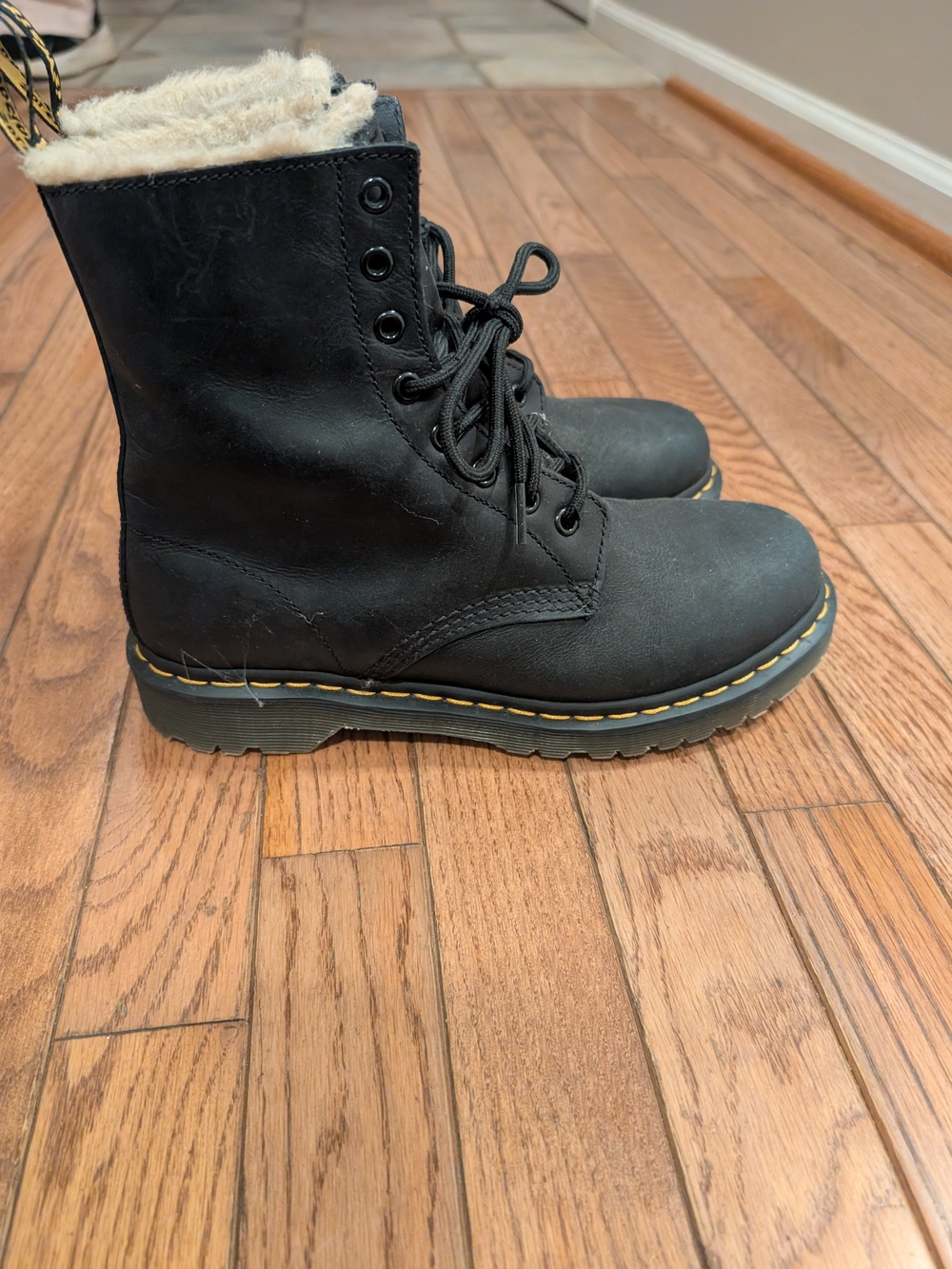 Dr. Martens Serena Black Faux Fur-Lined Leather Lace-Up Boots